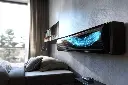 fire-place-is-lit-up-by-black-blue-flame.webp